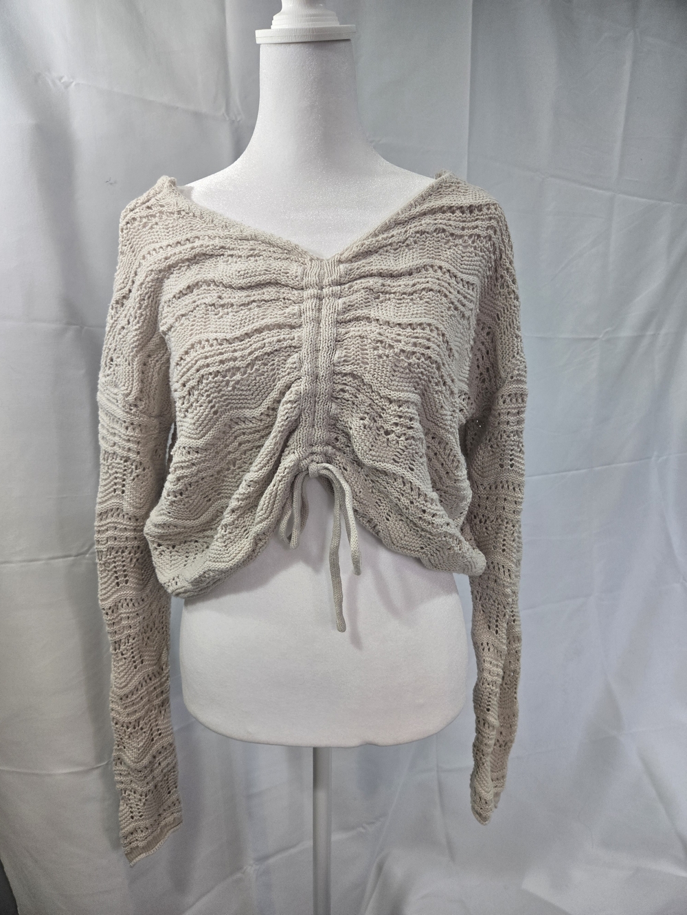 Jessica Simpson Beige Openwork V-Neck Drawstring Cropped In Front Sweater.